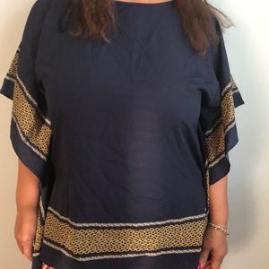 Dark blue loose top.
